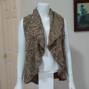 Sleeveless cableknit shrug sweater